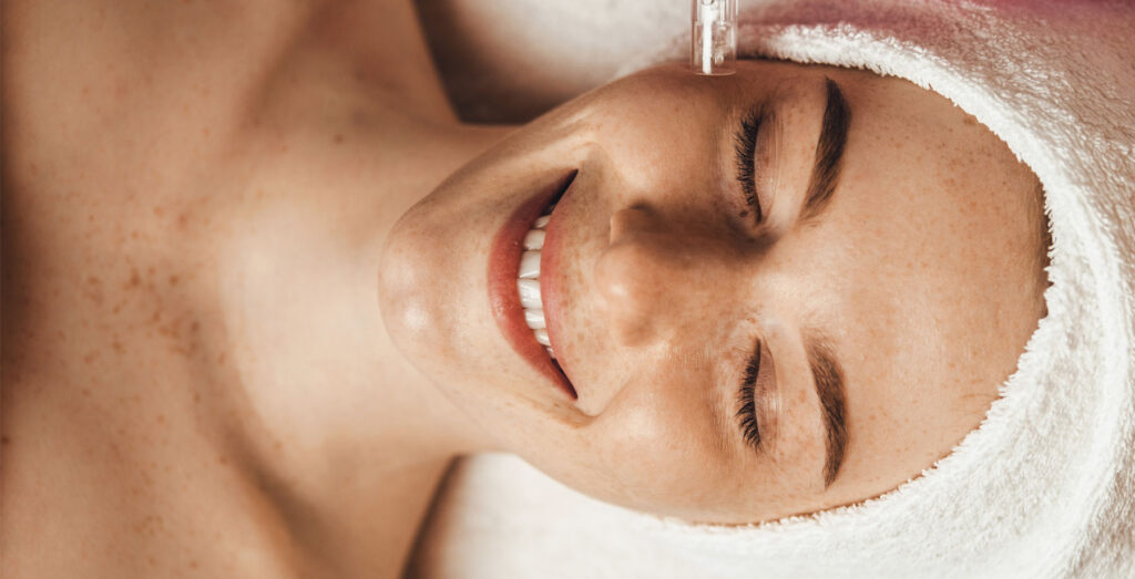 woman getting facial treatment
